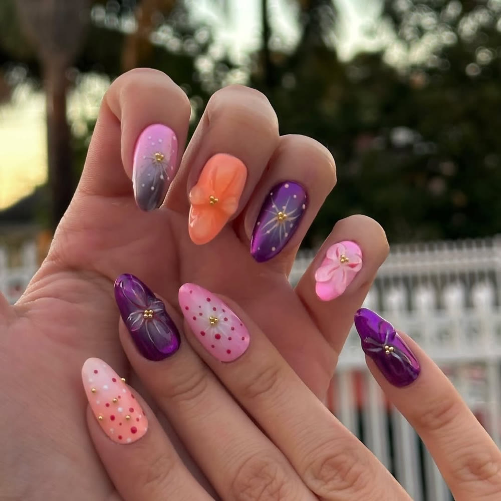 Recent NailMuseMiami nail set with 3D floral nail art in purple and pink