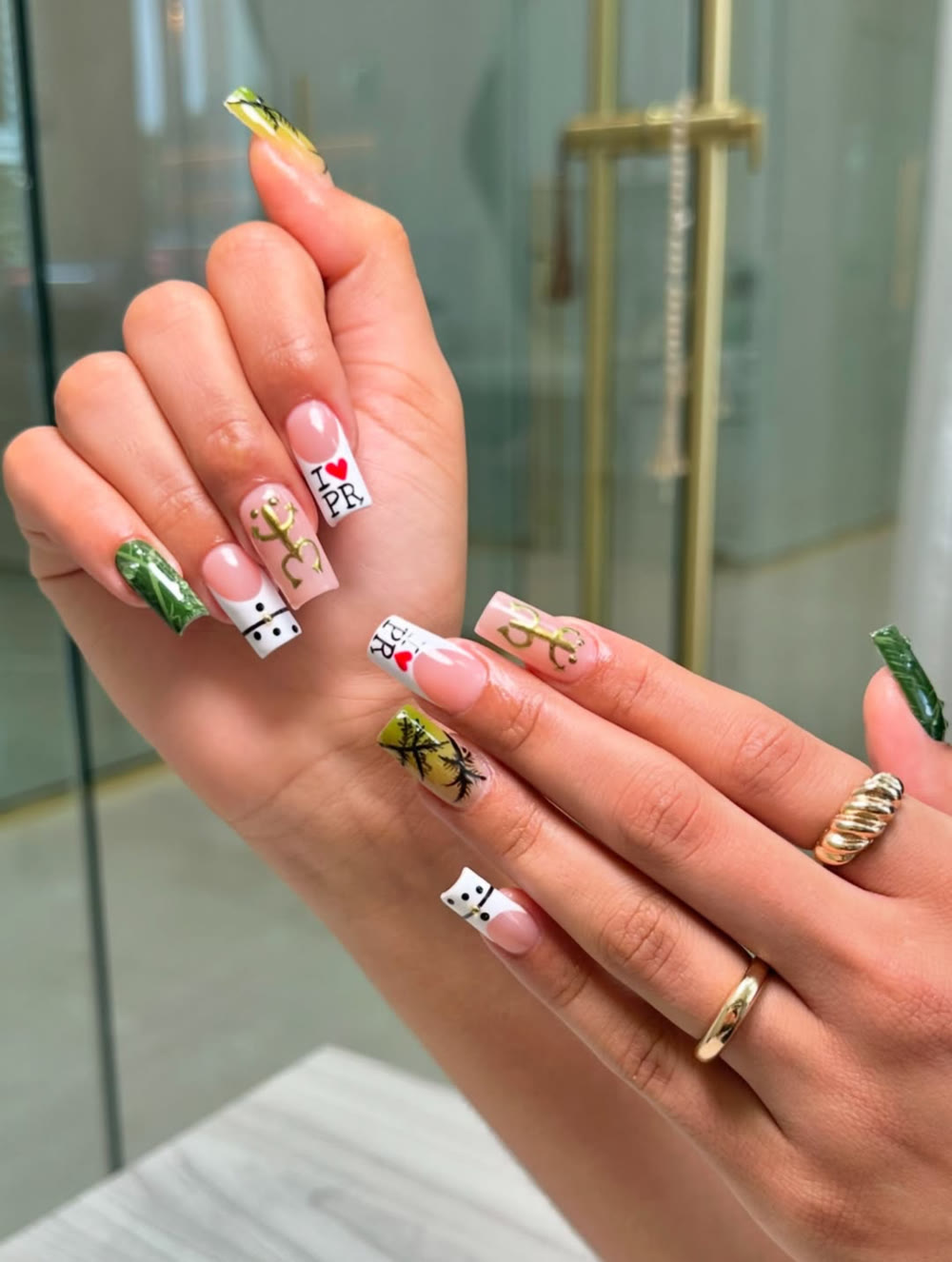 Recent NailMuseMiami nail set with palm tree nail art